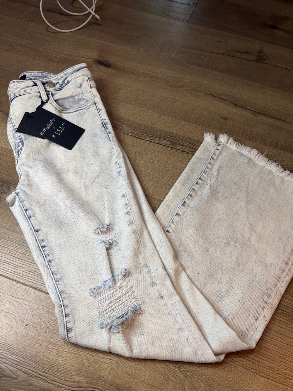 Risen light-wash flared denim jeans